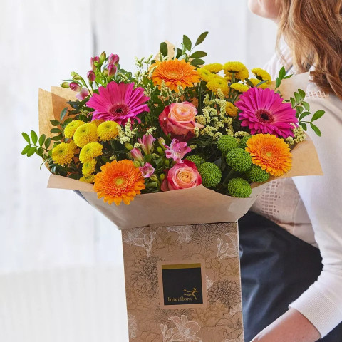 Brights hand-tied bouquet made with beautiful fresh flowers